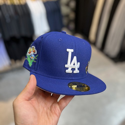 کلاه کپ فیت بک نیو ارا (NEW ERA LA) پروانه آبی تیره سایز (3/8)7 (58.7 CM)